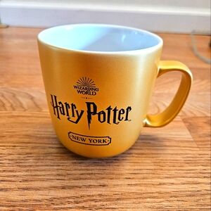 NEW Harry Potter Wizarding World New York Gold/Yellow Coffee Cup Mug